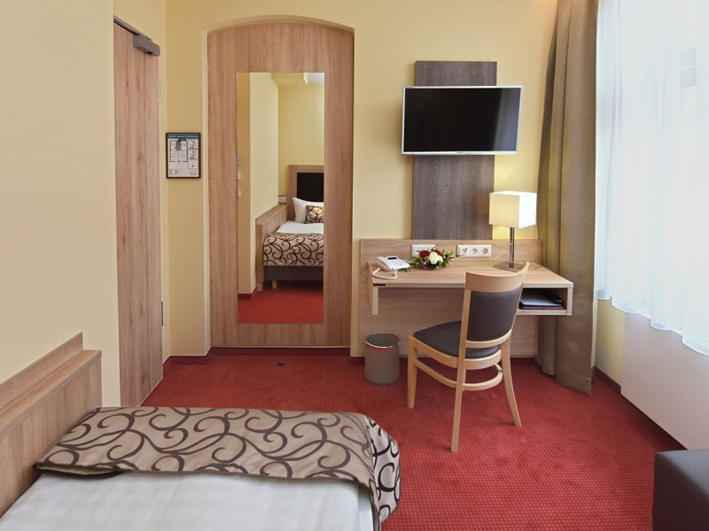 PORTINN_BERLIN_2025_Cafe_Josef_0007_Einzelzimmer-Superior 2jpg